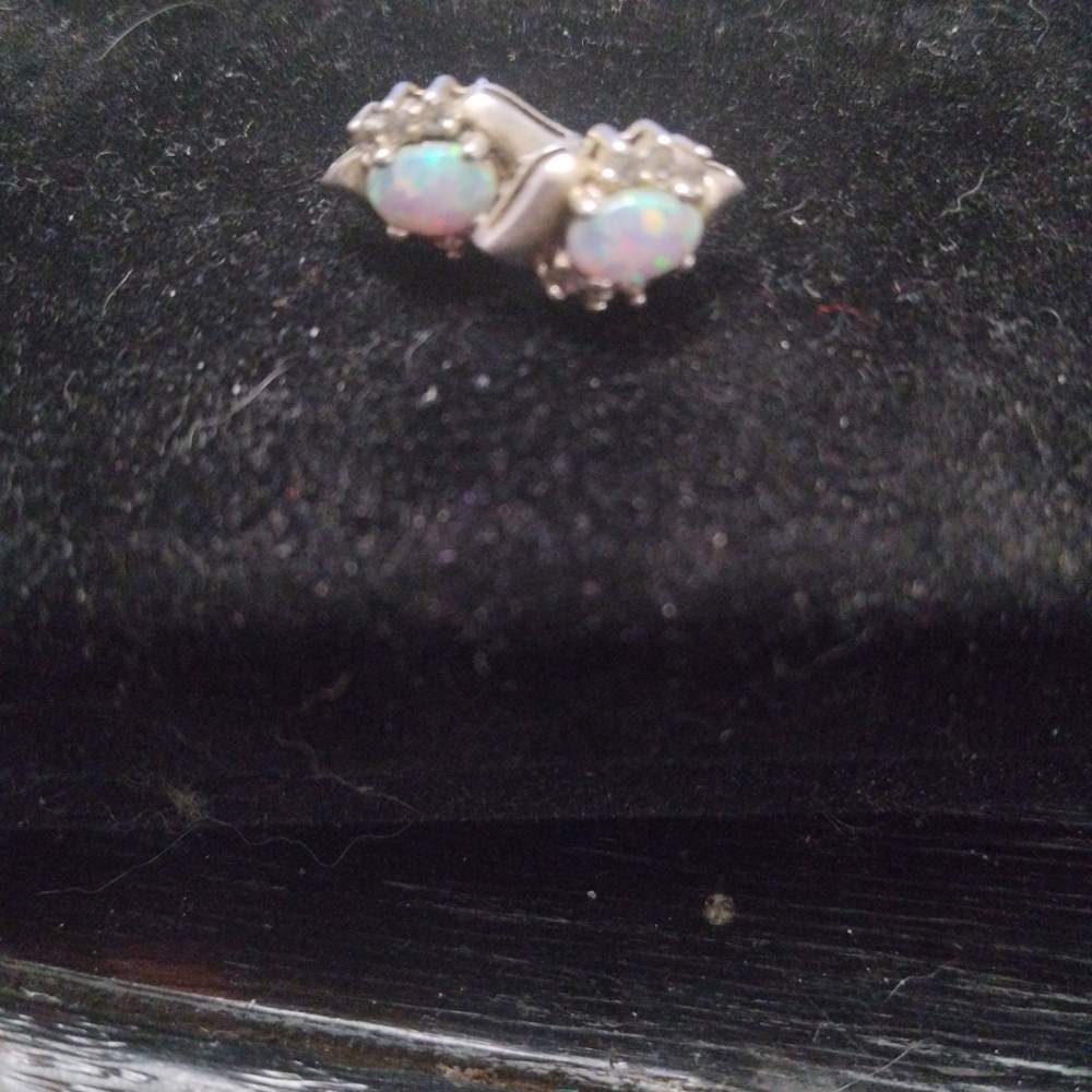 .925 silver opal earrings.